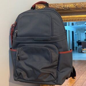 TUMI Alpha 3 Brief Pack in grey nylon and red/tan leather
